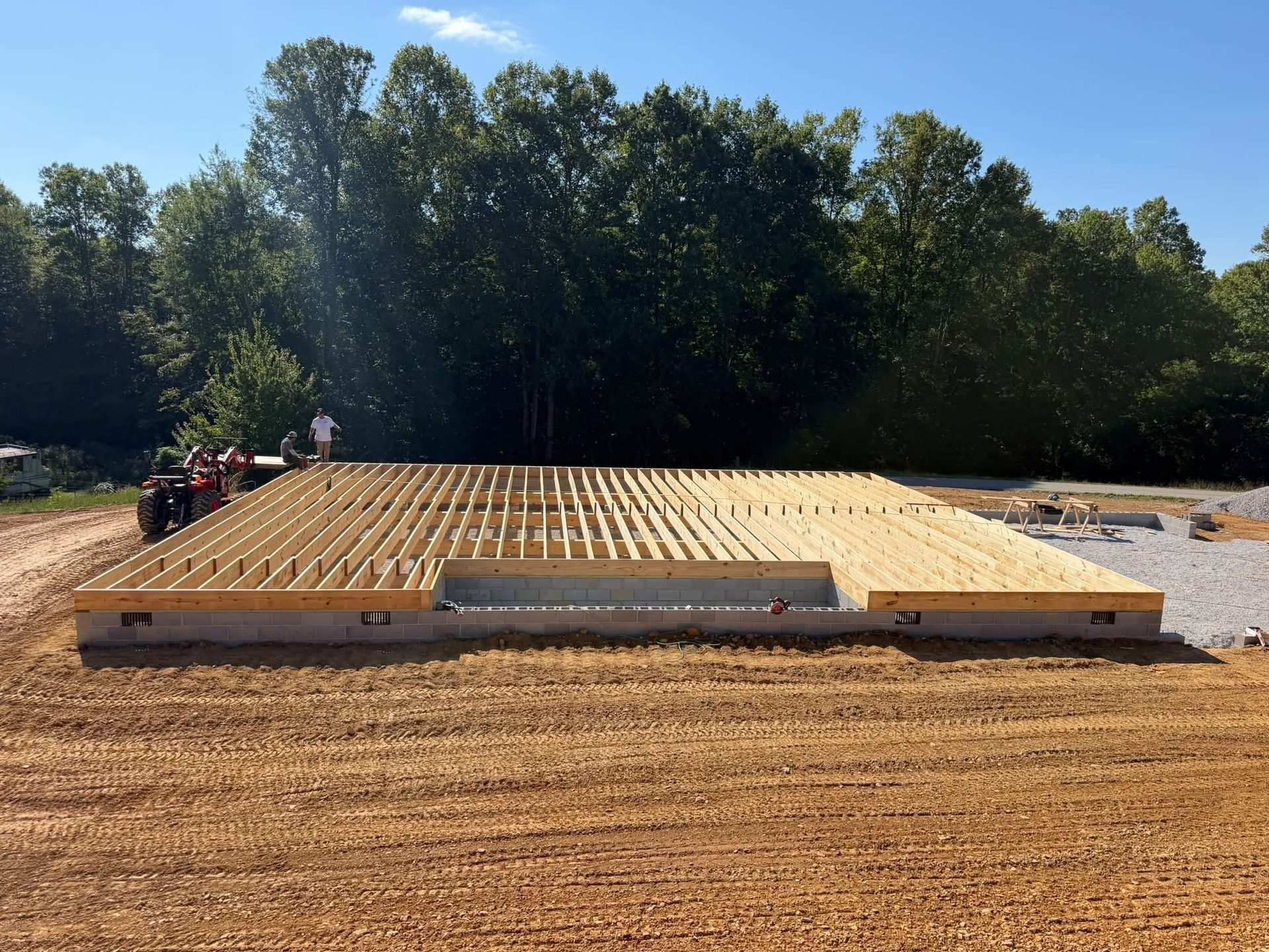 New home construction floor joist framing on block foundation