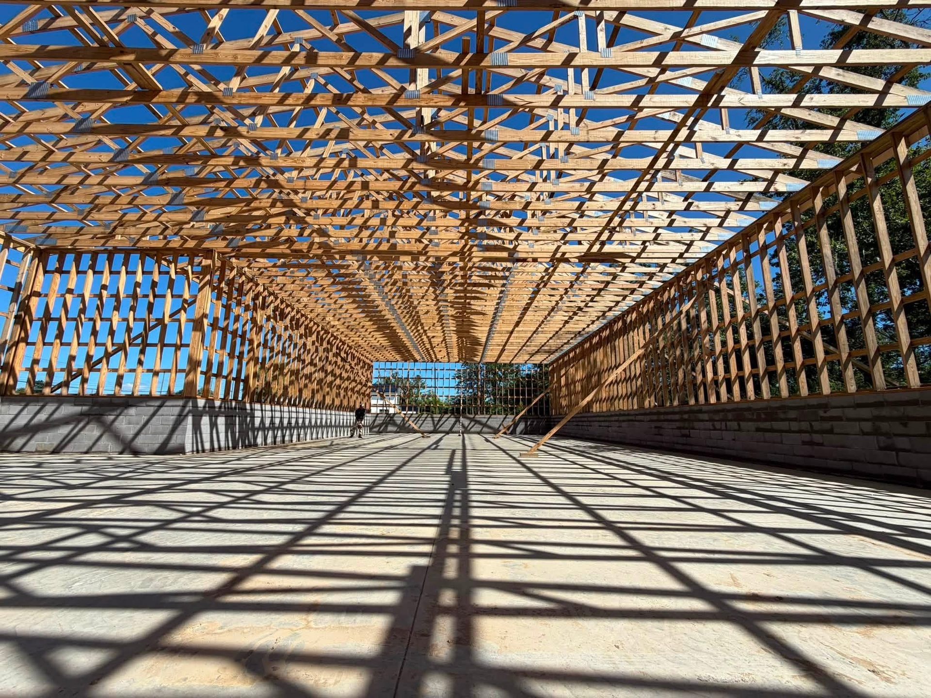 Roof truss framing on a new construction building